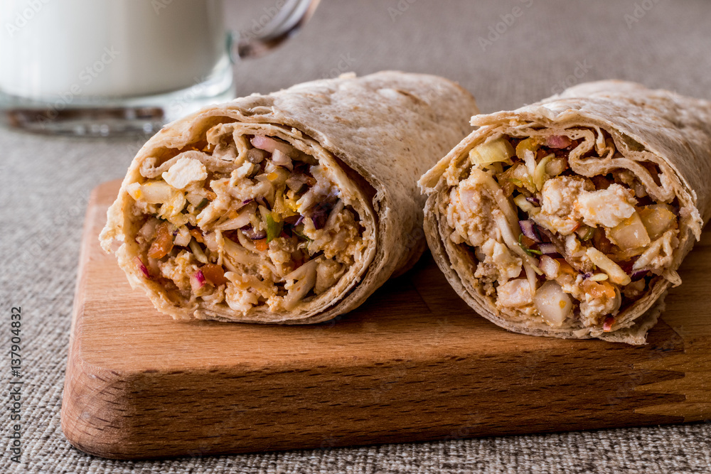 Fototapeta premium Chicken shawarma durum kebab with ayran or buttermilk / Tantuni.