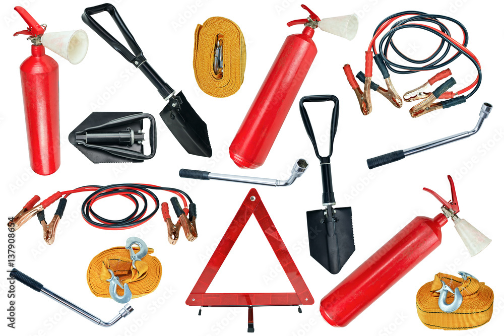 Elements of the essentials for a passenger car. Danger Safety Warning Triangle Sign, towing rope, fire extinguisher, Jumper cable, wheel wrench and shovel.