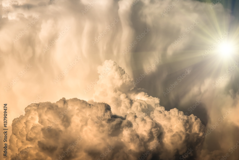 large clouds and sun before a storm, background