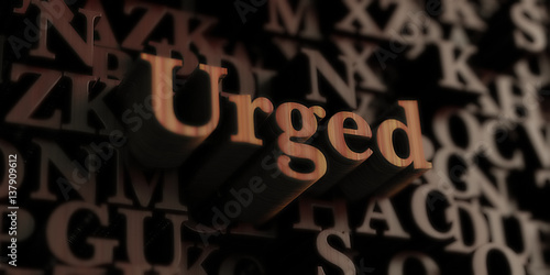 Urged - Wooden 3D rendered letters/message. Can be used for an online banner ad or a print postcard.