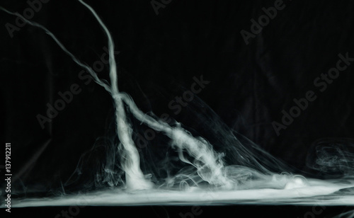 Vape trick tornado on a dark background