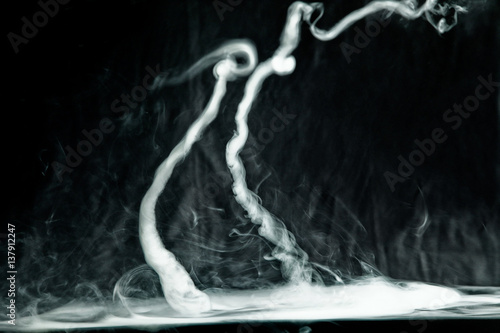 Vape trick tornado on a dark background
