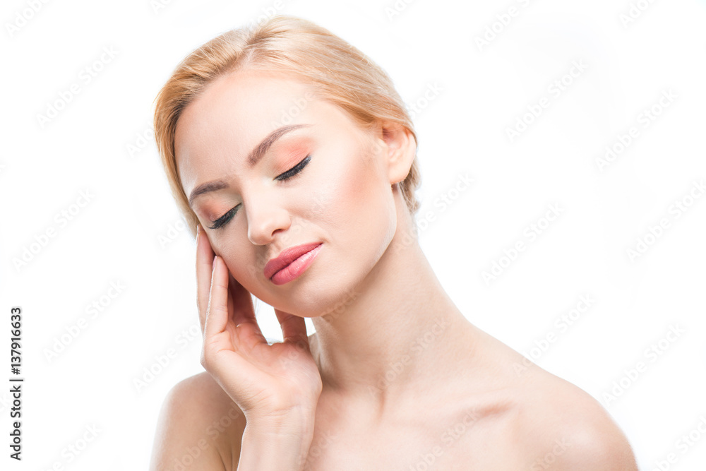 Portrait of gorgeous naked blonde woman with closed eyes posing on white, body care concept Portrait of gorgeous naked blonde woman with closed eyes posing on white, body care concept