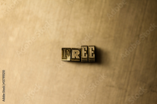 FREE - close-up of grungy vintage typeset word on metal backdrop. Royalty free stock illustration. Can be used for online banner ads and direct mail.
