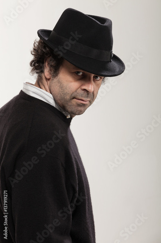 Portrait of a guy with black hat