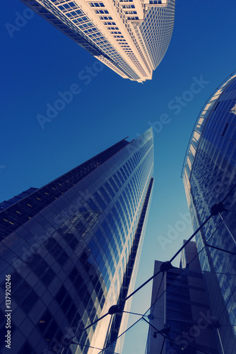 Canvas Print Three Corporate office buildings city Filter Blue Copyspace.
