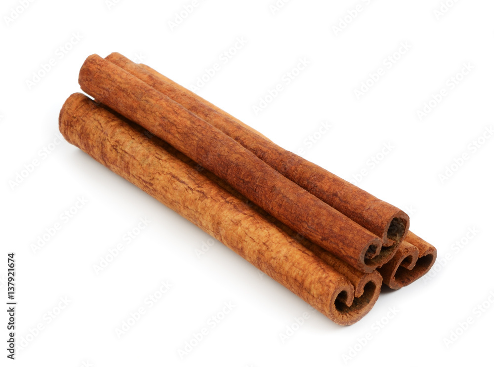 Cinnamon sticks isolated on the white background Cinnamon sticks isolated on the white background
