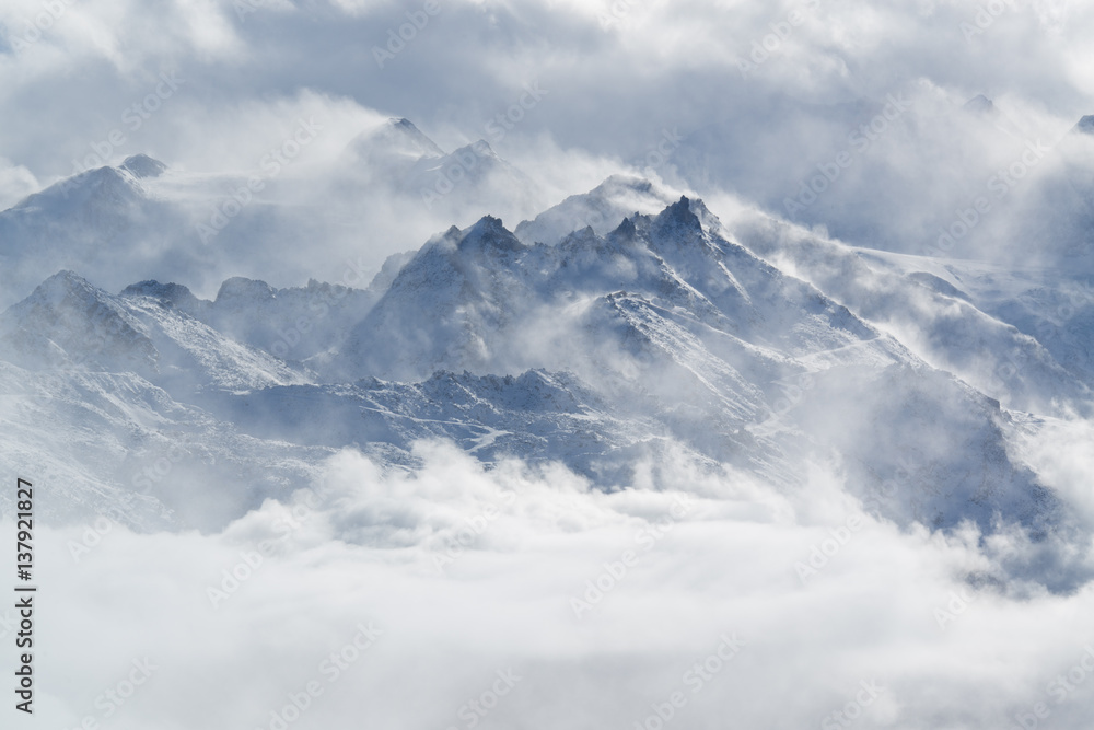 tops of the mountain top in clouds tops of the mountain top in clouds