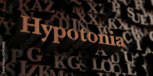 Hypotonia - Wooden 3D rendered letters/message.  Can be used for an online banner ad or a print postcard. photo