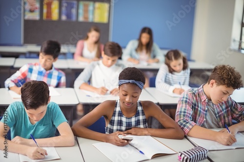 Students studying in classroom