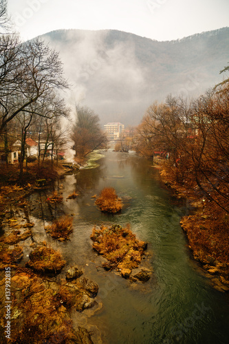 beautiful landscape with fog on the river Cerna photo