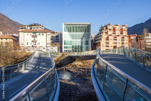 Pedestrian Bridge and Facade of MUSEION, the Museum of Modern and Contemporary Art of Bozen, in South Tyrol, Italy photo