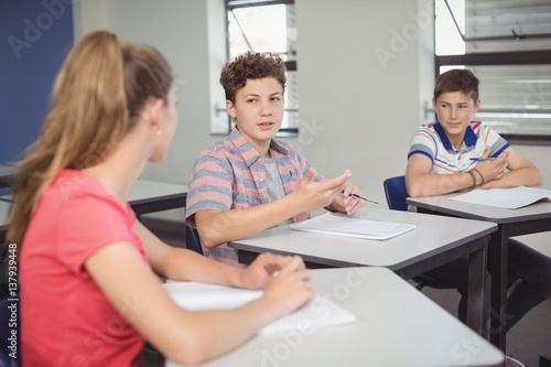 Students studying in classroom