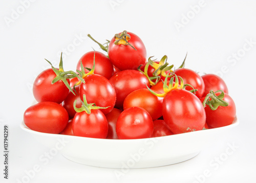 tomatoes on a white plate