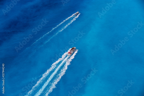 Boats in the blue sea © PASTA DESIGN