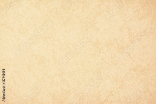 gold texture background paper in yellow vintage cream or beige color, parchment paper, abstract pastel gold gradient with brown, solid website background