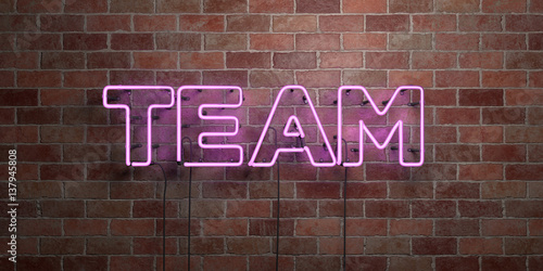 TEAM - fluorescent Neon tube Sign on brickwork - Front view - 3D rendered royalty free stock picture. Can be used for online banner ads and direct mailers..