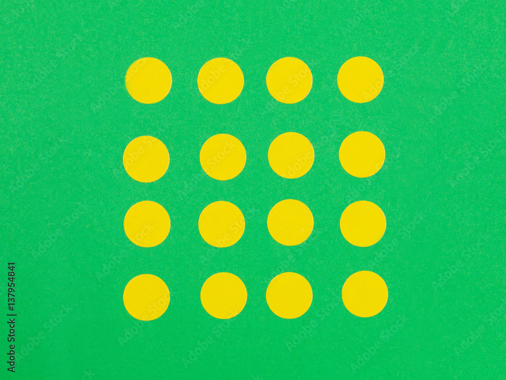 Yellow Spots on a Green Background