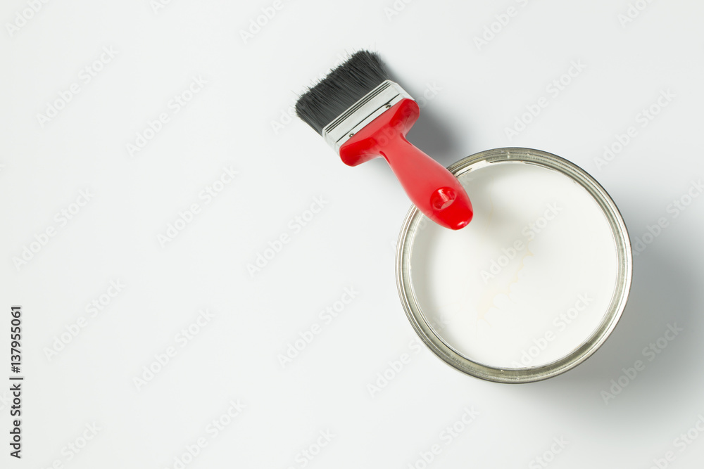White paint and brush White paint and brush