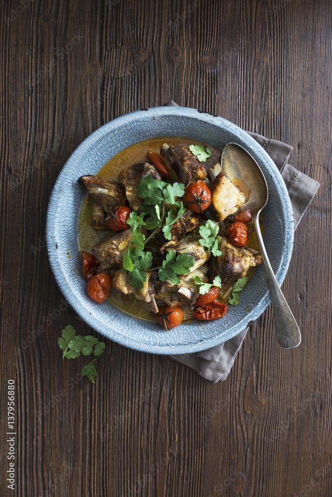 Lamb stew with cherry tomatoes and coriander Lamb stew with cherry tomatoes and coriander