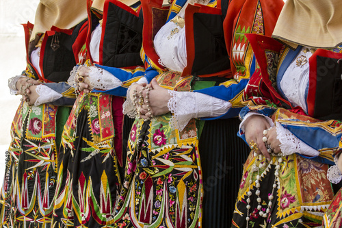 CAGLIARI, ITALIA -  MAGGIO 1, 2015: 359^ Processione Religiosa di Sant'Efisio - Sardegna - dettaglio di un costume tradizionale sardo femminile photo