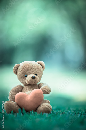bear doll and red heart with dramatic tone