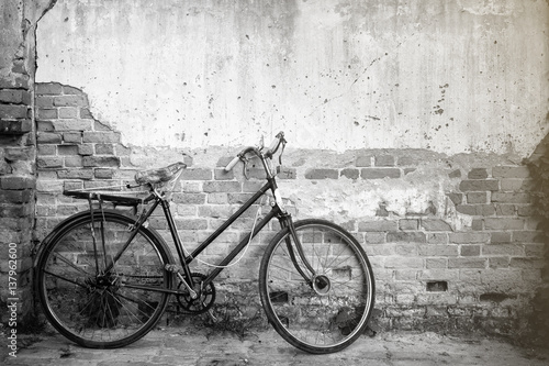 Bicycles on background old wall.