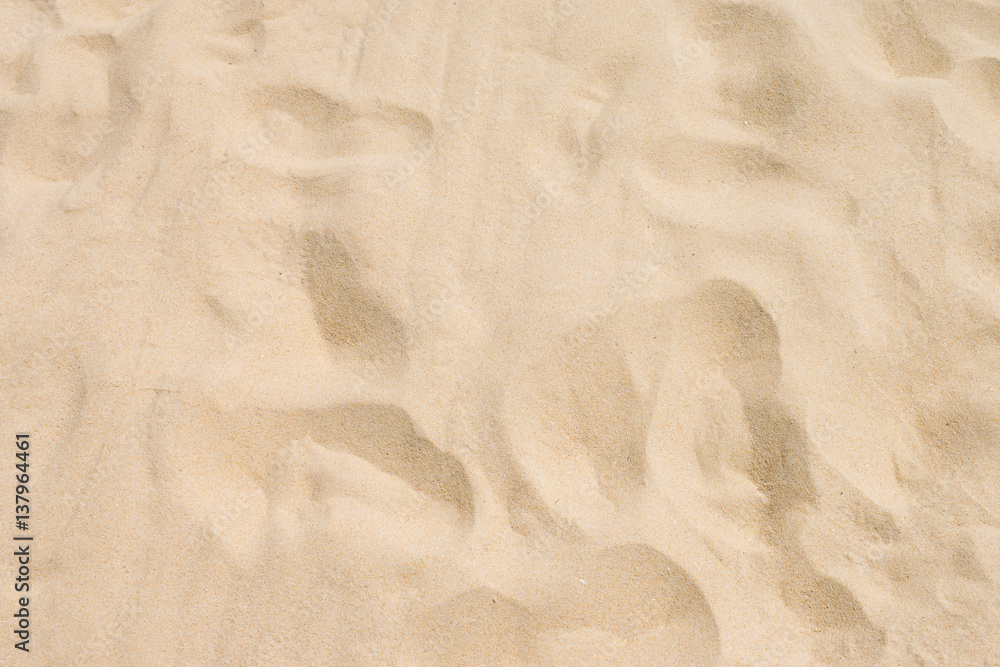 Fine beach sand in the summer sun Fine beach sand in the summer sun