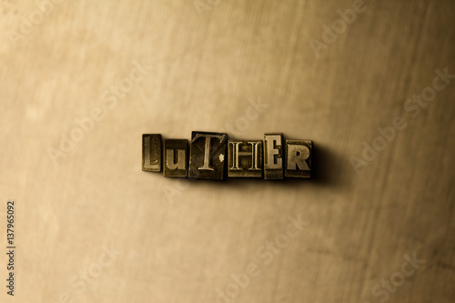 LUTHER - close-up of grungy vintage typeset word on metal backdrop. Royalty free stock illustration.  Can be used for online banner ads and direct mail. photo