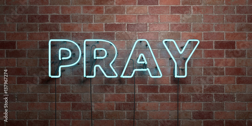 PRAY - fluorescent Neon tube Sign on brickwork - Front view - 3D rendered royalty free stock picture. Can be used for online banner ads and direct mailers..