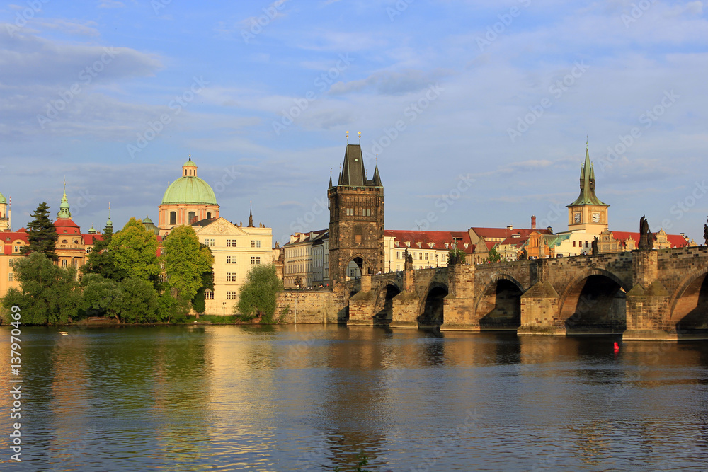 View on the Charles Bridge at the Vltava River, with the Old Town Bridge Tower in Prague, Czech Republic, Europe