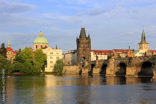 View on the Charles Bridge at the Vltava River, with the Old Town Bridge Tower in Prague, Czech Republic, Europe