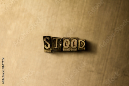 STOOD - close-up of grungy vintage typeset word on metal backdrop. Royalty free stock illustration. Can be used for online banner ads and direct mail.