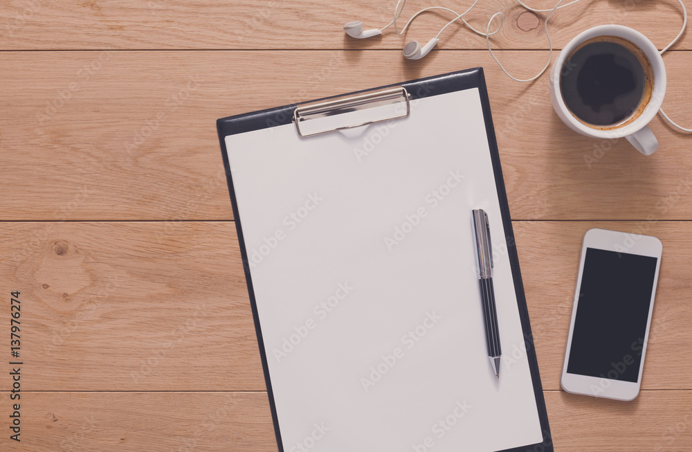 Mockup for checklist, note paper and coffee on wood background Mockup for checklist, note paper and coffee on wood background