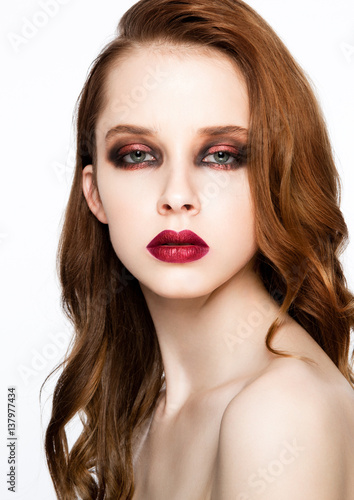 Beauty fashion model ginger hair and red makeup