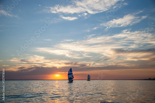 sailboats at sunset © Elena