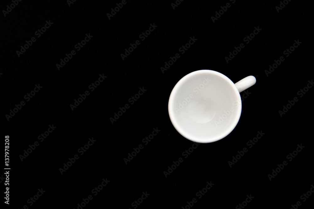 top view of a white cup, isolated on black background top view of a white cup, isolated on black background