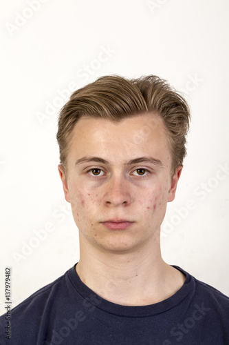 sad looking caucasian teenage boy
