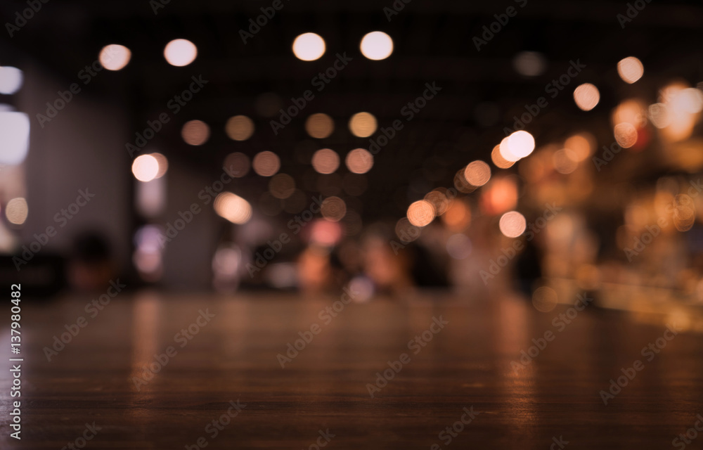 Empty wood table top on blur light gold bokeh of cafe restaurant in dark  background/selective focus. Stock Photo | Adobe Stock