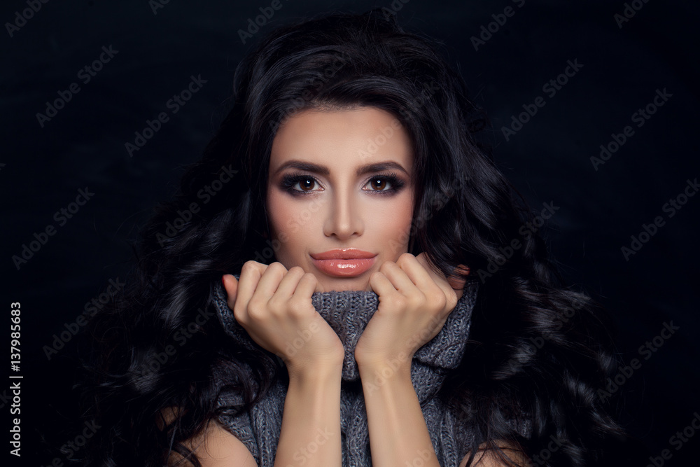 Beautiful Fashion Model with Dark Curly Hair, Makeup and Gray Jersey. Portrait of Friendly Woman Beautiful Fashion Model with Dark Curly Hair, Makeup and Gray Jersey. Portrait of Friendly Woman