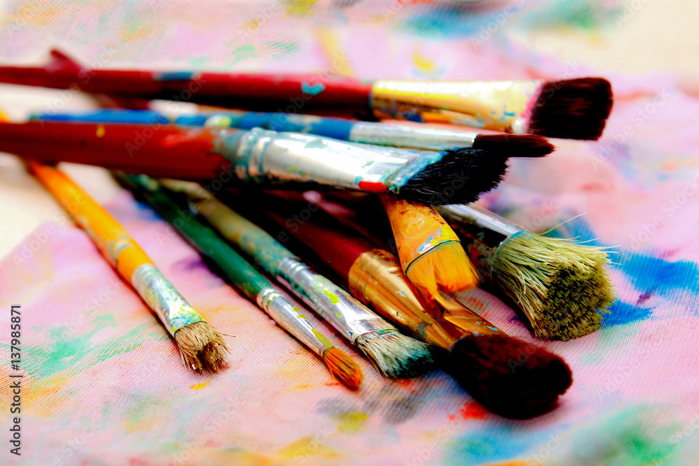Artistic paintbrushes and palette - colorful world