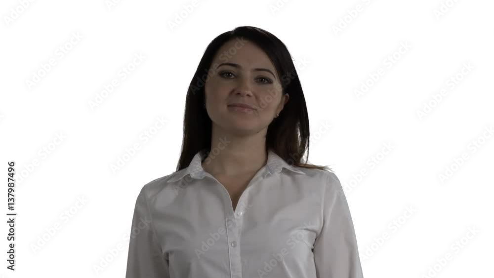 Brunette business woman with folded arms looking at camera on white background. 4k footage PNG with alpha channel. Brunette business woman with folded arms looking at camera on white background. 4k footage PNG with alpha channel.