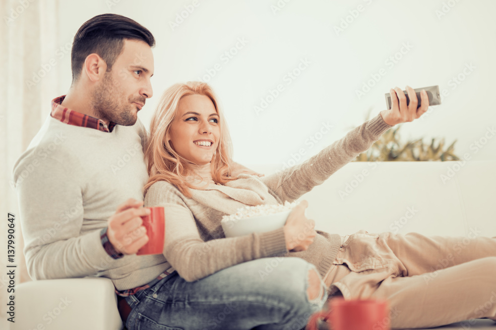 Young couple watching tv Young couple watching tv