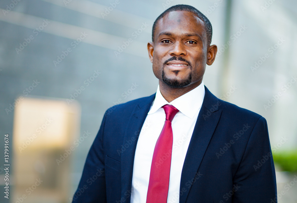 Fototapeta premium Confident black businessman outdoor