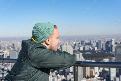 Tourist at a observation deck in Tokyo, Japan 