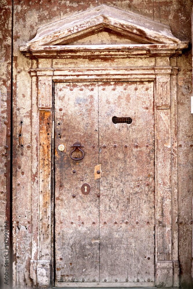 An old wooden door in Palermo. Italy.
