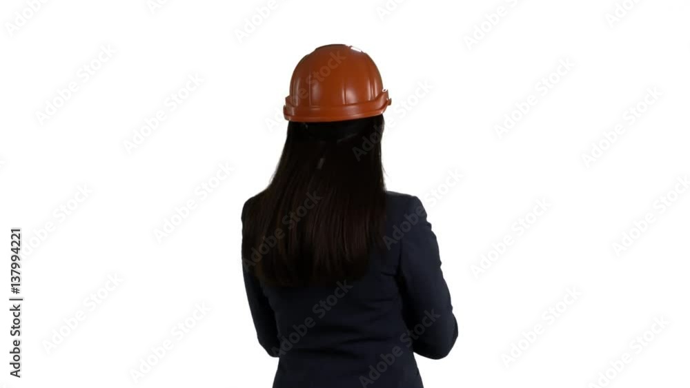 Rear view of female engineer in safety helmet against white background. 4k footage PNG with alpha channel. Rear view of female engineer in safety helmet against white background. 4k footage PNG with alpha channel.