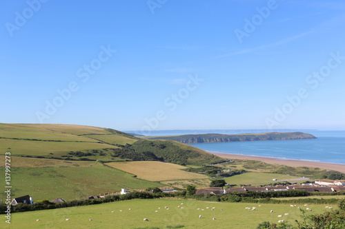 SHEEP FIELDS ABOVE WOOLACOMBE BEACH IN DEVON