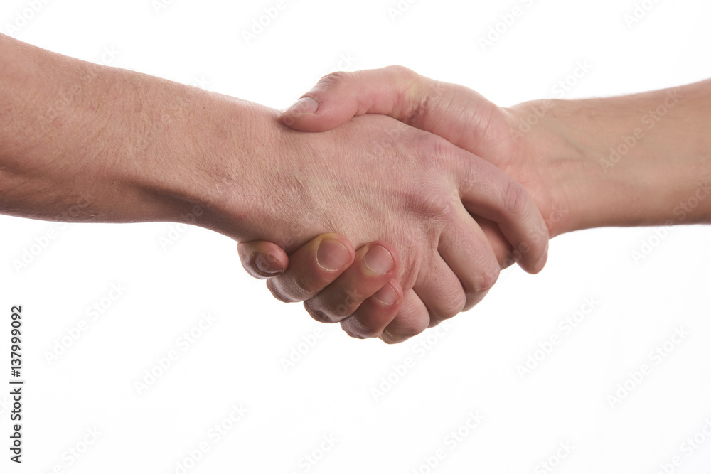 Closeup image of a Business handshake. Business handshake and business people concept. Two men shaking hands over isolated white background. Partnership, Deal.