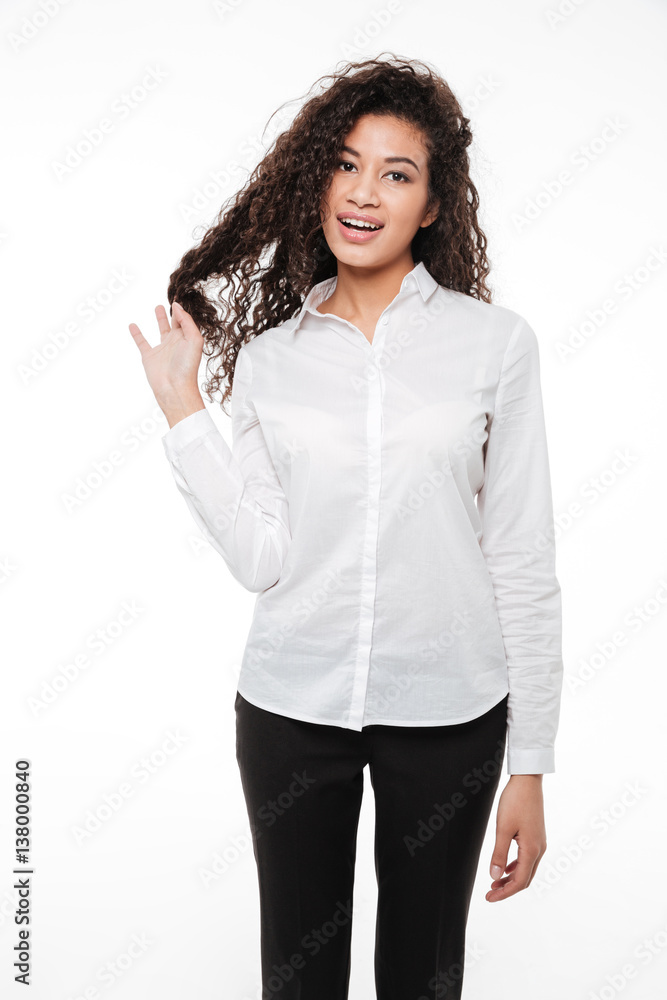 Amazing young curly african woman over white background Amazing young curly african woman over white background